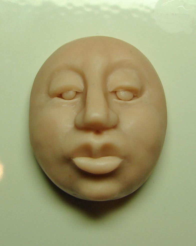 лицо из полимерной глины