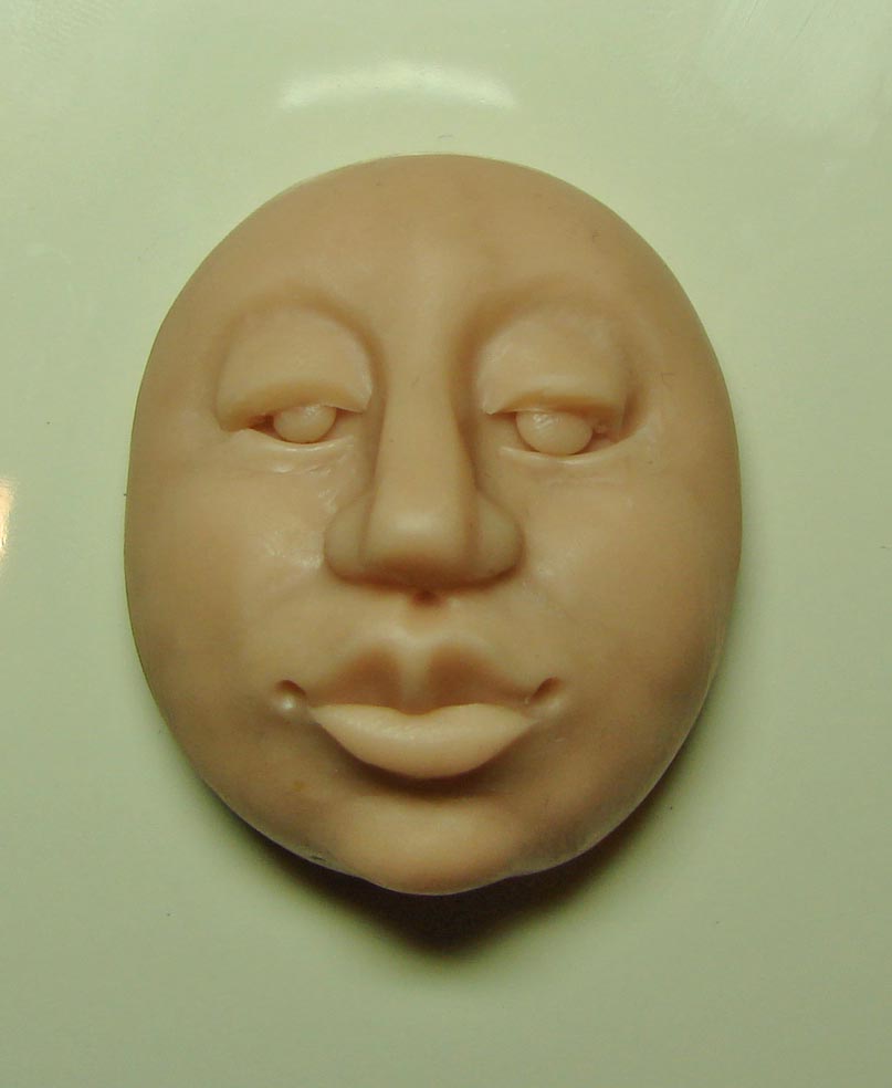лицо из полимерной глины